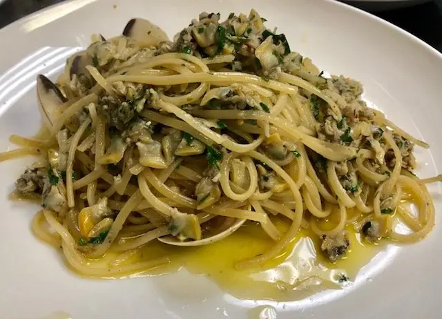 Landini Brothers signature dishes Veal SaltimboccaLinguine alle VongoleProsciutto e Melone
